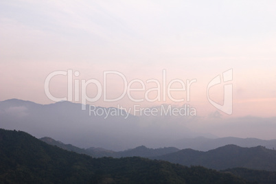 Morning Mist at Tropical Mountain Range, Thailand.
