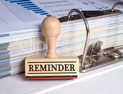 Reminder Stamp with Binder in the Office