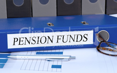 Pension Funds - blue binder in the office