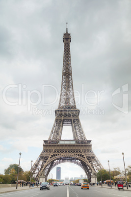 Eiffel tower surrounded by tourists