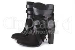 Black ankle boots isolated on white
