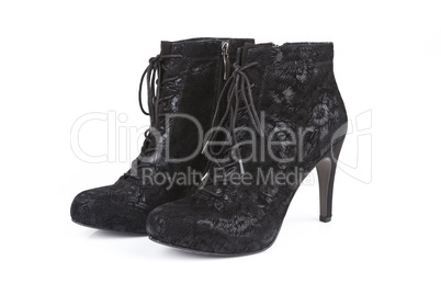 Black ankle boots isolated on white