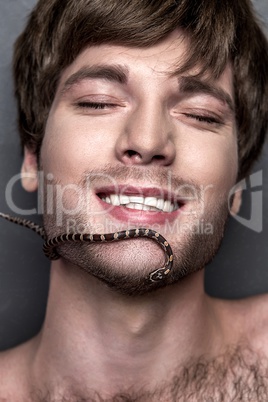 Portrait of a Young Handsome Man with Snake on His Face