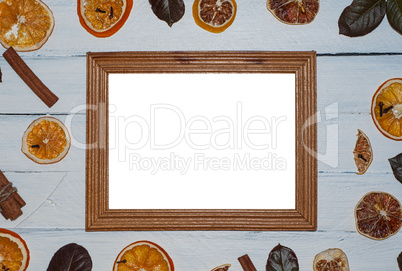 Empty wooden frame on a white wooden surface,