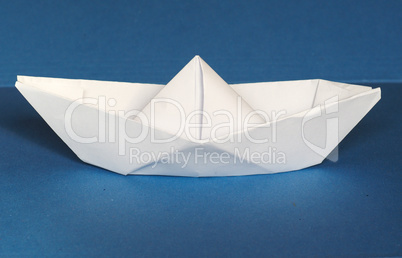 paper boat over blue