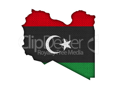 Karte und Fahne von Libyen auf altem Leinen