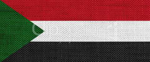 Fahne von Sudan auf altem Leinen