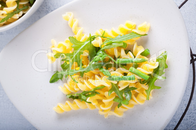 Pasta salad with asparagus and arugula