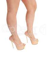 Isolated woman legs with heels.