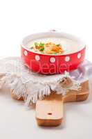 A bowl of creamy cauliflower soup
