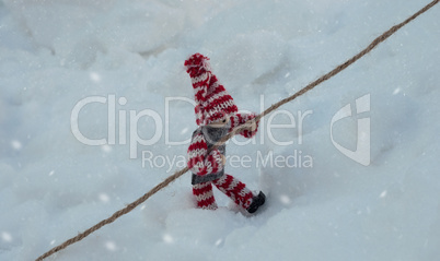 toy  holding on to a rope