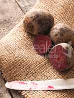Organic beet root on rustic background