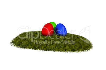 Three Easter eggs on grass