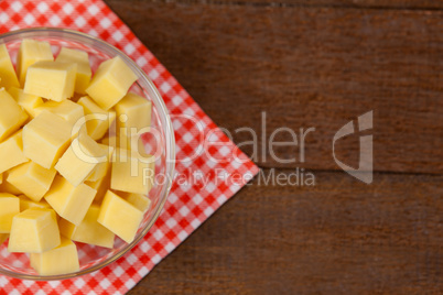 Cheese cubes in bowl on cloth napkin