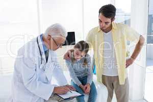 Doctor discussing report with patient