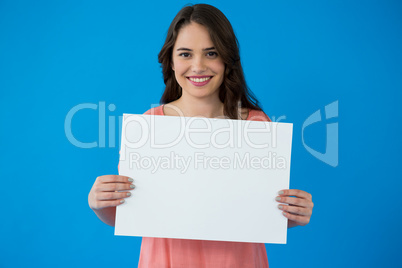 Woman holding a blank placard