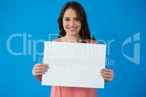 Woman holding a blank placard