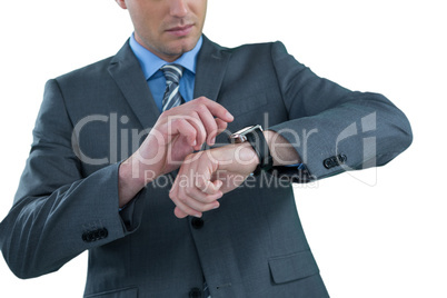 Businessman checking his smart watch