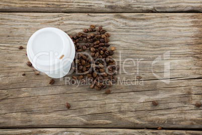 Coffee beans with disposable coffee cup