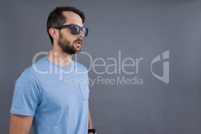 Man in blue t-shirt and sunglasses