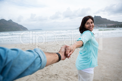 Couple enjoying on beach