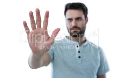 Man pretending to touch an invisible screen