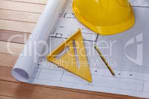 Architectural plan with tools and hard hat