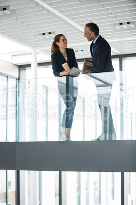 Business colleagues interacting with each other