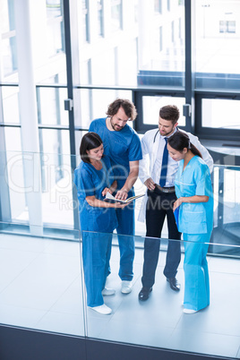 Surgeons, doctor and nurse having a discussion