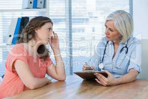 Doctor interacting with patient