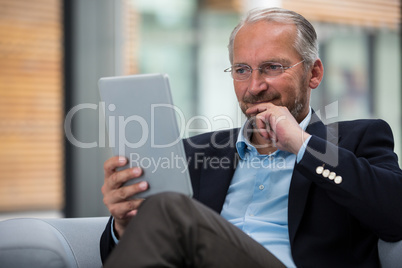 Businessman holding digital tablet Businessman holding digital tablet
