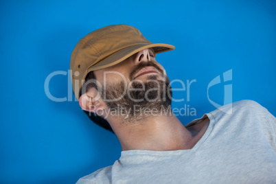 Man in cap relaxing