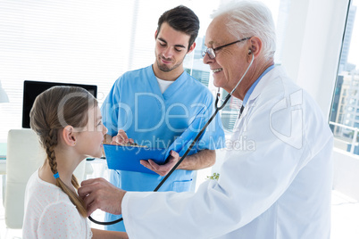 Doctor examining a patient