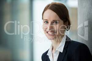 Smiling businesswoman in office