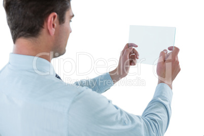 Businessman pretending to be using futuristic digital tablet