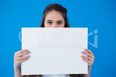 Woman holding a blank placard