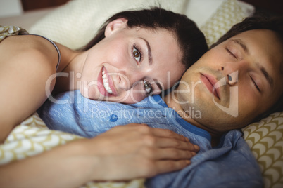 Romantic couple relaxing on bed Romantic couple relaxing on bed