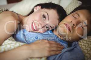 Romantic couple relaxing on bed