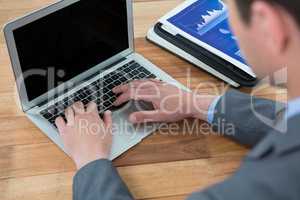 Businessman using laptop