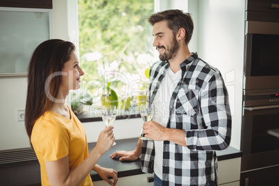 Happy couple holding glasses of champagne