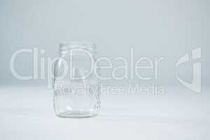 Close-up of empty glass jar