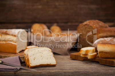 Various bread loaves with slices