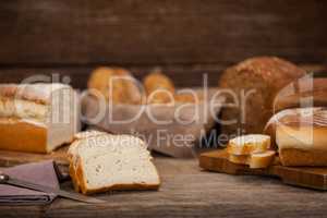 Various bread loaves with slices