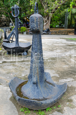 Old heavy anchor with curved doors, fort Galle, Sri Lanka