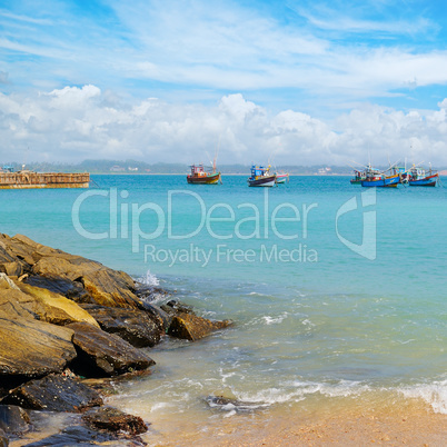 beautiful seascape with fishing boats on the water