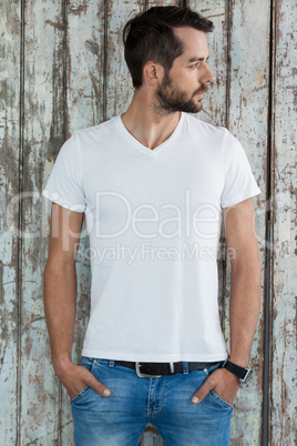 Handsome man in white t-shirt and blue jeans