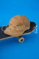 Cap on skateboard