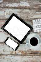 Digital tablet, smartphone and coffee cup