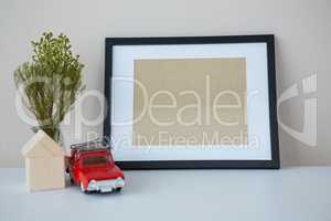 Toy car with picture frame