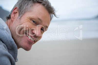 Close-up of happy man on beach